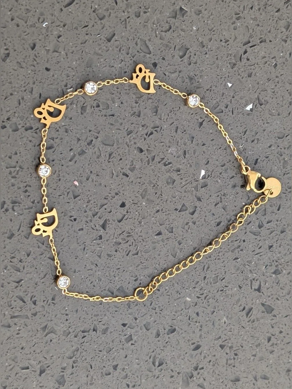 Gold-Tone Script Charm Bracelet with Clear Crystal Accents Stainless Steel